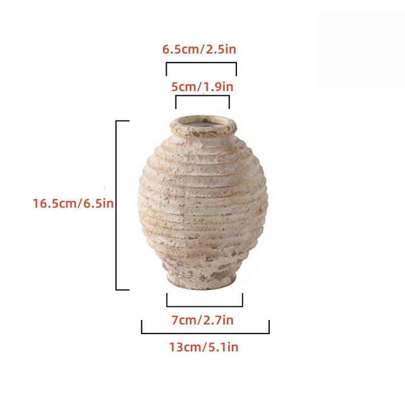 Ceramic vase with dimensions labeled on a white background