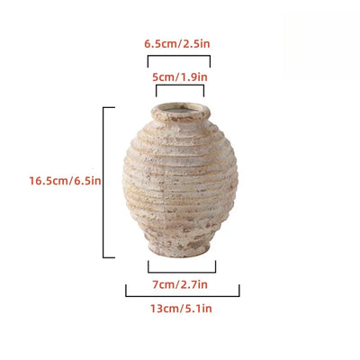 Ceramic vase with dimensions labeled on a white background