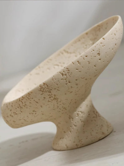 Beige stone soap holder on a white background
